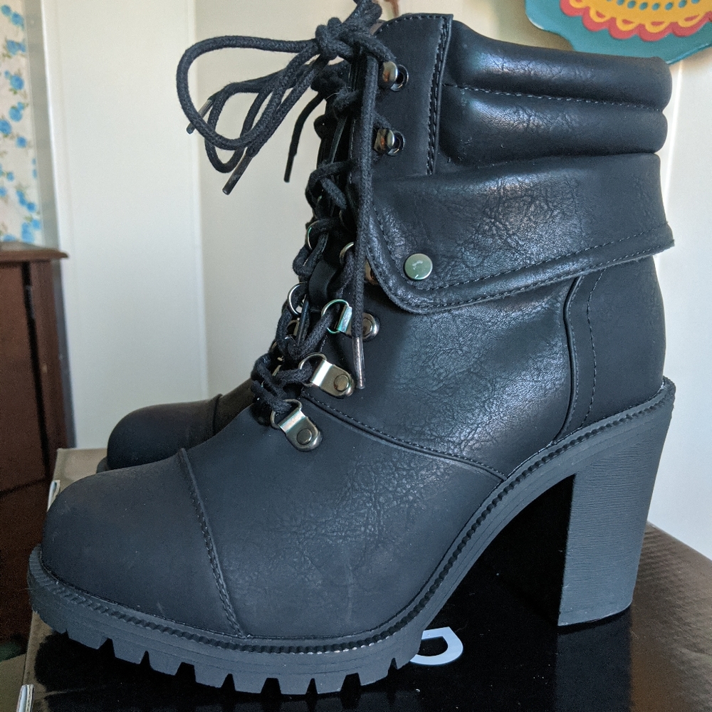 Torrid black faux leather lace up hiking boots.